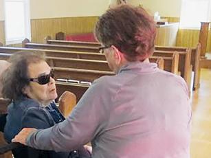 Country music legend – and Graham County native – Ronnie Milsap visits with Virginia Zakroski at Meadow Branch Church on March 14. Milsap specifically asked for Zakroski to meet with him during his two-day stay in the county. Photo courtesy of Shaun Adams