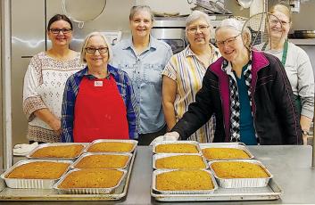 Phyllis Hoffman, Bonnie Dodson, Tere Moore, Eileen Kallmayer, Nancy Norcross and Victoria Baker (from left) pose with some of the goods they baked at Stecoah Valley Cultural Arts Center for the Graham County Women’s Club Easter Bake Sale. Photo courtesy of Sherri Orr/Graham County Women's Club