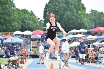 Robbinsville sophomore Zoie Shuler broke the 1A state record in the triple jump Saturday, capturing her second state championship of the afternoon in the process. Photos by Kevin Hensley/sports@grahamstar.com