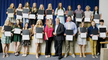 Twenty Robbinsville High School seniors were awarded the Cody Family Scholarship at May 26's academic banquet. All names are listed from left. Front row: Sarah Gibby, Klancy Stevens, Brynn Harn, Patience Frapp, Dana Adams, Dirk Cody, Carson White, Cheyenne Rowland, Jacob Hall and Aidan Farley. Back row: Halee Anderson, Baylee Parham, Yeika Jimenez, Kelsey Waldroup, Reagan Ditmore, Haize Moore, Ivy Odom, Keylie Jordan, Cody Cline, Jaret Panama and Montana Buchanan. Not pictured is Marco Beltran.