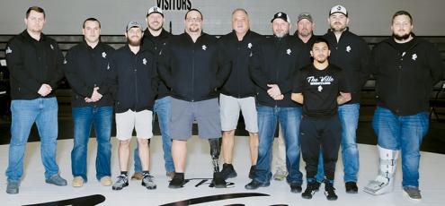 The 2021-22 Robbinsville High School wrestling coach staff was recently named the National Wrestling Coaches Association’s Boys Assistant Staff of the Year for North Carolina. From left are Colby White, D.J. Robinson, Weston Haney, Josh Winfrey, head coach Todd Odom, James Keifer, Travis Hooper, Billy Knight, Irvin Portugal, Wren Millsaps and Josiah Phillips. Not pictured are Jason Tom Sawyer, Brandon Lee and Carter Williamson. Photo courtesy of Maria Shook Photography