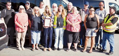 For the fourth time in five years, Graham County Transit has been recognize with a Safety Award from the N.C. Public Transportation Association. All names are listed from left. Front row: Tracy Jenkins, Donna Hill, transit director Juanita Colvard, Penny Postell, Jennifer Conley, Donna McCracken and Kenny Blevins. Back row: Michael Collins, Michael Badalucca, Andrew Hyde, Terry Crawford, Lamar Carver, Frank Deyton and Tommy Holland. Photo by Kevin Hensley/editor@grahamstar.com