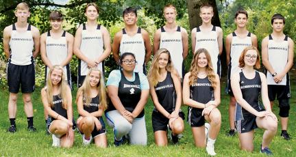 The 2022 Robbinsville varsity cross country team. Names are listed from left in both rows. Front: Skyler Oliver, Kamree Oliver, Jennifer Guzman, Liberty Hartley, Abby Wehr and Elizabeth Boyle. Back: Ethan Webster, Skyler Anderson, Bruce Helms, Xander Wachacha, William Cable, Zeb Stewart, Albert Avella and Braxton Hicks. Not pictured is head coach Kaitlyn Carringer-Adams. Photo by Kevin Hensley/sports@grahamstar.com