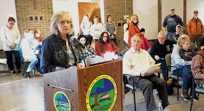 Bonnie Jean Price (behind the podium) addresses the Board of Commissioners at the Oct. 18 meeting, seeking support for a horse riding arena in Graham County. Photo by Randy Foster/news@grahamstar.com