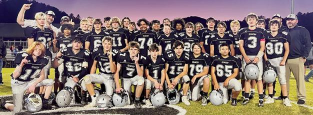 The JV Robbinsville Black Knights gather for one last time at midfield on Sept. 28 following their 26-6 win over Hayesville. The victory clinched a share of the Smoky Mountain Conference title. Photo by Kevin Hensley/sports@grahamstar.com