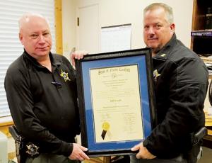 Graham County Sheriff’s Office Detective Jeff Knight (right) received the Advanced Service Award from the N.C. Sheriffs’ Education and Training Standards Commission. With Knight is Graham County Sheriff Jerry Crisp.