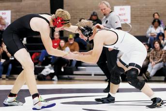 Robbinsville senior Willie Riddle locks horns with Franklin’s Chase Browning during the Nov. 30 home dual against the Panthers. Photo courtesy of Miranda Buchanan/Robbinsville High School Yearbook