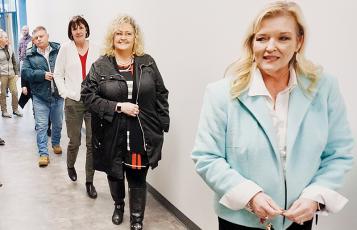 Robbinsville Middle School Principal Tonia Walsh (right) leads a tour of officials Tuesday, including county project manager Jason Marino, county finance officer Becky Garland and interim county manager Kim Crisp (from back). Photos by Randy Foster/news@grahamstar.com