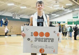 A foul shot late in Saturday’s third-round playoff game at Eastern Randolph gave Robbinsville senior Brock Adams his 1,000th career point. He finished his Black Knights run holding steady to the tally. Photo by Kevin Hensley/sports@grahamstar.com