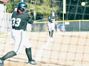 Robbinsville senior Fala Welch – shown recording an RBI on March 20 at Copper Basin, Tenn. – posted another scoring single in Tuesday’s 8-2 win over Cherokee. Photo by Montana Buchanan/The Graham Star