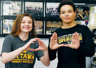 It’s going to be a challenge, but Robbinsville alumni Aynsley Fink and Jayden Nowell are returning to the mat – this time, at the collegiate level. Both signed to wrestle for Ottawa (Kan.) University on Easter Sunday. Photos by Kevin Hensley/sports@grahamstar.com