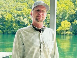 Fontana Village Marina Manager Brandon Jones was recently named a recipient of the North Carolina Wildlife Federation’s annual Governor Conservation Achievement Award. Photo by Latresa Phillips/The Graham Star