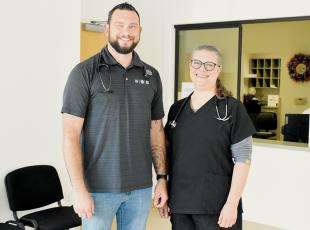 Chris Woods (left) and Deborah Allen are two of the newest members to join the team at the county-owned urgent care facility on South Main Street, which has spent the last 5-plus months rebuilding its operation. Photo by Kevin Hensley/editor@grahamstar.com