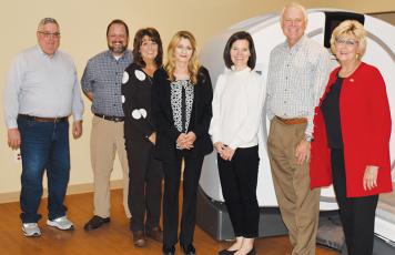 Dignitaries gather around the new CT scanner at Graham County Urgent Care, which was funded by the Golden Leaf Foundation. Photo by Ruby Annas/news@grahamstar.com
