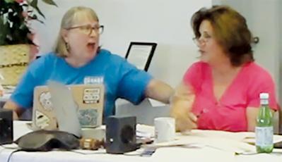 This screenshot from a recording shows the moment Lake Santeetlah Councilwoman Diana Simon slapped Mayor Connie Gross during the town’s June 8  meeting. Assault charges were filed over the incident; a hearing Monday led to the case being continued until 2024.