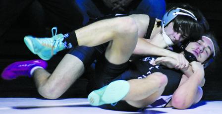 Kyler Branham hooks Mitchell's Jayden Burleson for an eventual near-fall in the second round of the state dual-team tournament Saturday. Branham went on to score the second majority decision for Robbinsville in the match. Photo by Kevin Hensley/sports@grahamstar.com