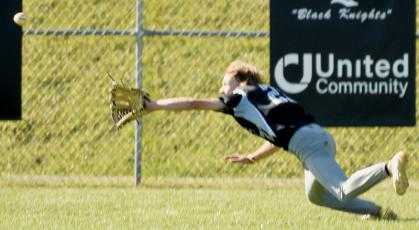 Benton Gibby lays it all on the line to snag a fly ball Tuesday against Hayesville. Gibby made the catch and Robbinsville went on to preserve an 11-7 win over the Yellow Jackets. Photos by Kevin Hensley/sports@grahamstar.com
